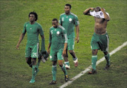 Dickson Etuhu, Rabiu Afolabi, Yakubu Ayegbeni and Danny Shittu of Nigeria walk off dejectedly after being eliminated from the 2010 World Cup by South Korea. Some of Nigeria's star players have been accused of sabotaging a friendly match against Bafana in August Picture: GALLO IMAGES