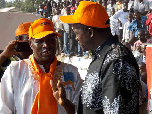 A file photo of Migori Governor Okoth Obado and Migori ODM chair Philip Makabong'o.