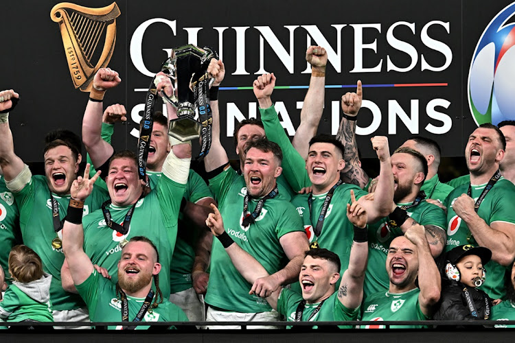 Ireland captain Peter O'Mahony lifts the Six Nations trophy after their victory against Scotland at Lansdowne Road in Dublin on Saturday.