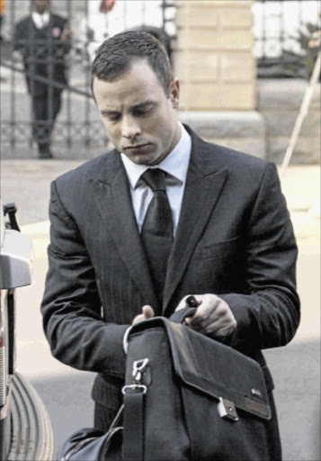 File photo: Oscar Pistorius returns to court after mental evaluation PHOTO: CHARLIE SHOEMAKER/GETTY IMAGES