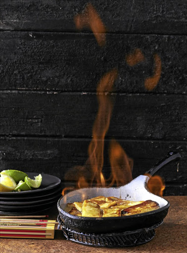 Flaming cheese (Cheese Saganaki) This simple and delicious Greek starter is a great way to learn the art of flambe.