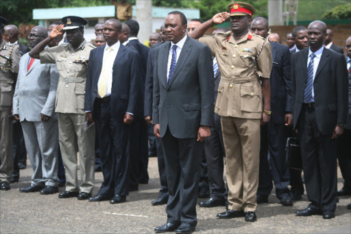 President Uhuru Kenyatta after the flagging off of police vehicles at the Uhuru park. Photo/File