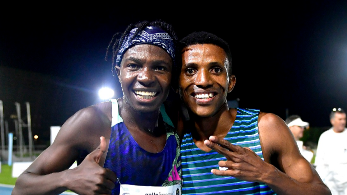 Ryan Mphahlele, left, and Tshepo Tshite celebrate their 1,500m personal bests at the Green Point stadium in Cape Town last year.