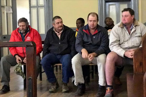 IN THE DOCK: Robert, Steven and Jonathan Armstrong and Dane Smith appeared in the Komga Magistrate’s Court yesterday Picture: ZWANGA MUKHUTHU