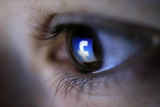 A picture illustration shows a Facebook logo reflected in a person's eye, in Zenica, March 13, 2015. Photo/reuters
