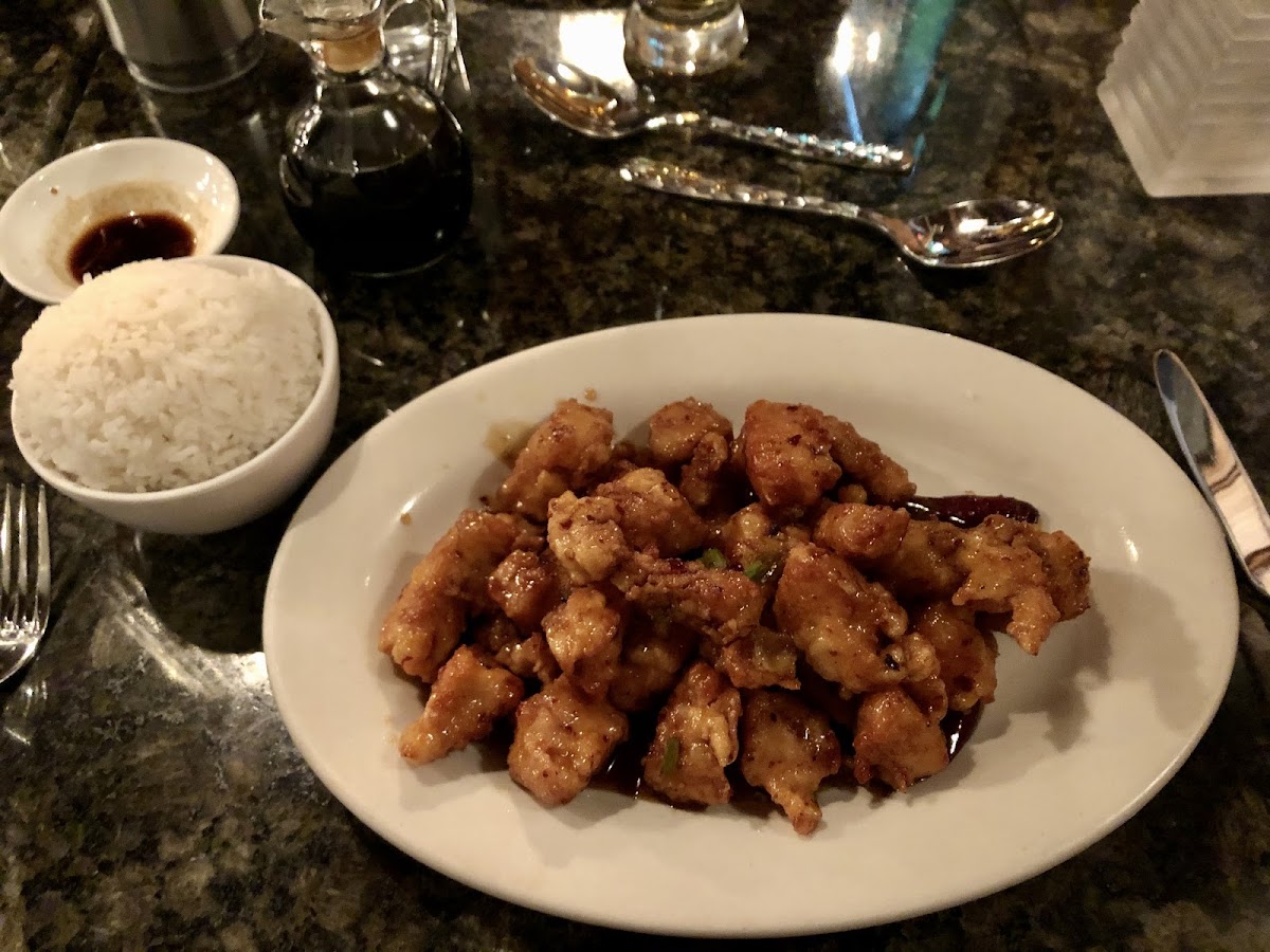 General Tso’s Chicken made from scratch with white meat, tossed in corn starch, and a gf sauce.