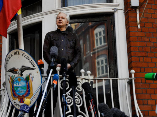 WikiLeaks founder Julian Assange is seen on the balcony of the Ecuadorian Embassy in London, Britain, May 19, 2017. /REUTERS