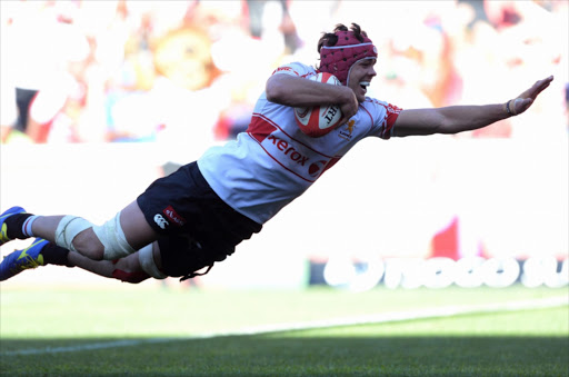 Warren Whiteley of the Lions dives over for his try during the Absa Currie Cup semi final match between Xerox Golden Lions and Cell C Sharks at Ellis Park on October 18, 2014 in Johannesburg, South Africa.