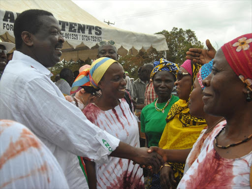Amani National Congress party leader Musalia Mudavadi greets party supporters after opening an office at Jilore ward in Malindi constituency on Sunday October 9 . He said they are in the process of forming a super alliance which will consist of all opposition parties to win 2017 elections. Photo Alphonce Gari