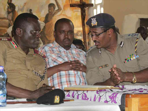 Rift Valley regional coordinator Wanyama Musiambo (L) Governor Tolgos and County Police boss in Elgeyo Abdallah Sharrif during a security meeting at Tot
