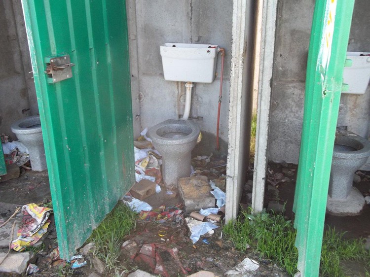 Communal toilets in Burundi informal settlement in Cape Town have not been cleaned for months.