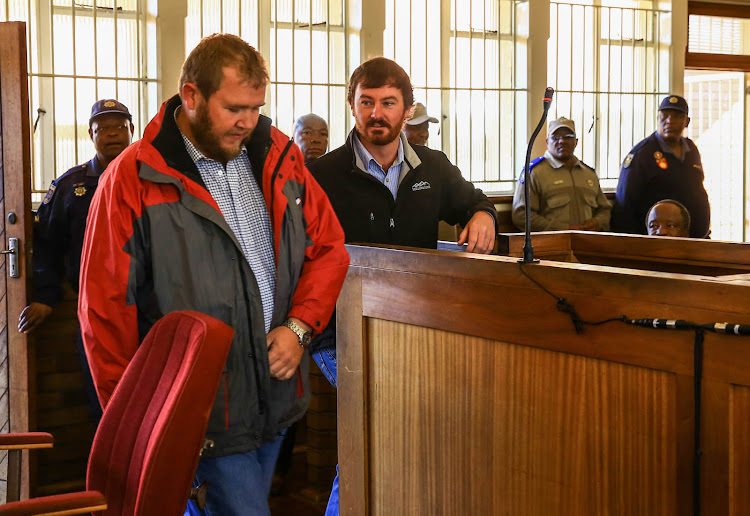 The two farmers Pieter Doorewaard and Phillip Schutte who accused of murdering Mahlomula Mosweu in the Coligny Magistrate court.
