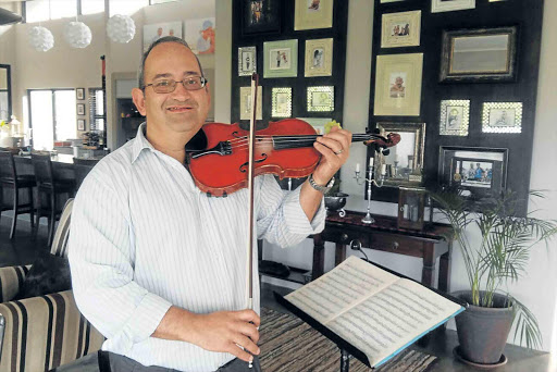 NOTEWORTHY DRIVE: Histopathologist and violinist Dr Piet Swanepoel plans to rejuvenate the classical chamber music scene by inviting musicians to perform in the city Picture: BARBARA HOLLANDS