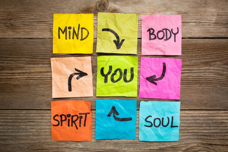 mind, body, spirit, soul and you - balance or wellbeing concept - handwriting on colorful sticky notes against grained wood. credit 123rf