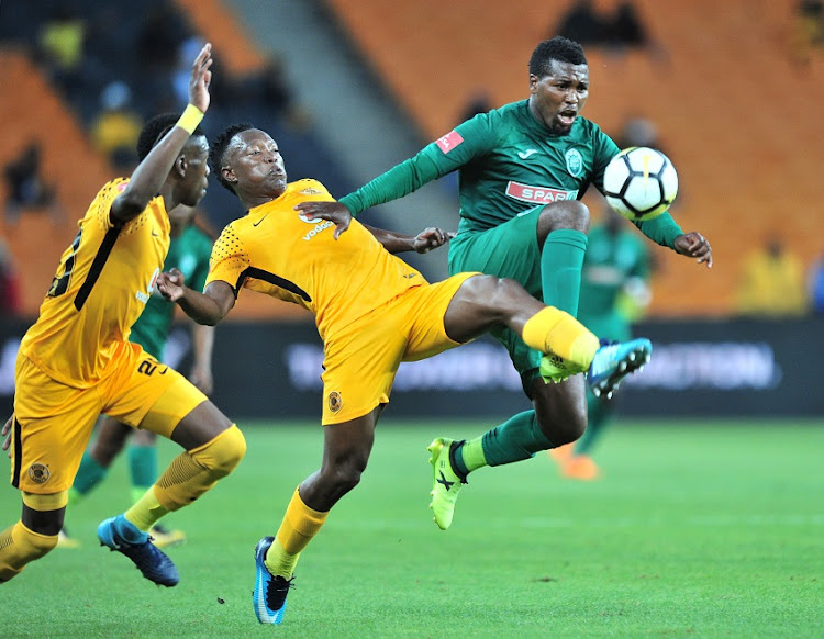 Teenage Hadebe and Daniel Cardoso of Kaizer Chiefs challenged by Mhlengi Cele of AmaZulu during the Absa Premiership 2017/18 match between Kaizer Chiefs and AmaZulu at FNB Stadium, Johannesburg on 17 March 2018.