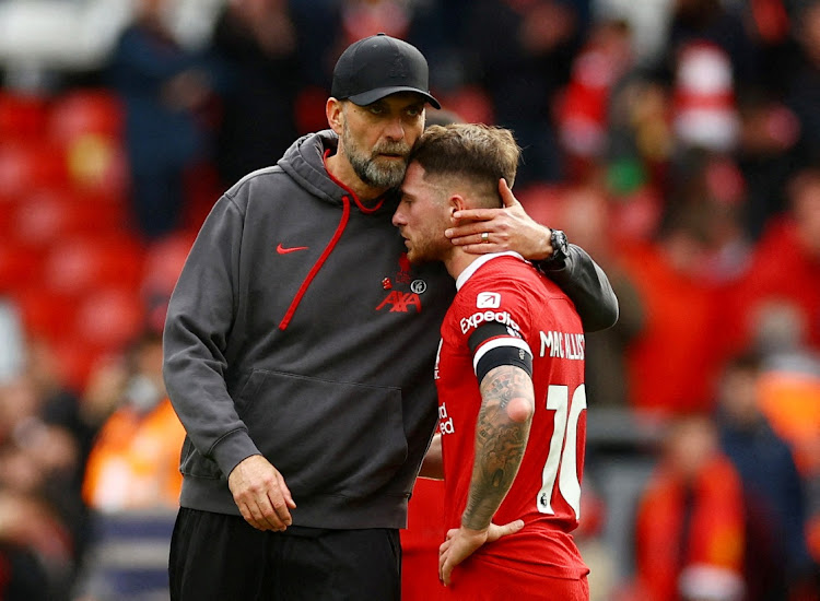 Liverpool manager Jurgen Klopp consoles Alexis Mac Allister after the loss to Crystal Palace at Anfield, Liverpoo on April 14, 2024