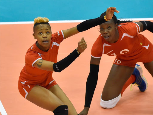 Jane Wacu and Monica Biama play against Algeria during last year’s FIVB Women’s World Cup in Japan.