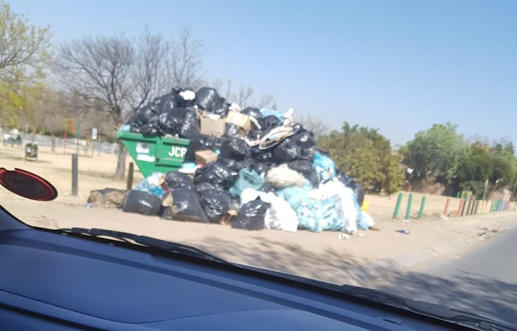 Uncollected refuse piles up in Midrand.