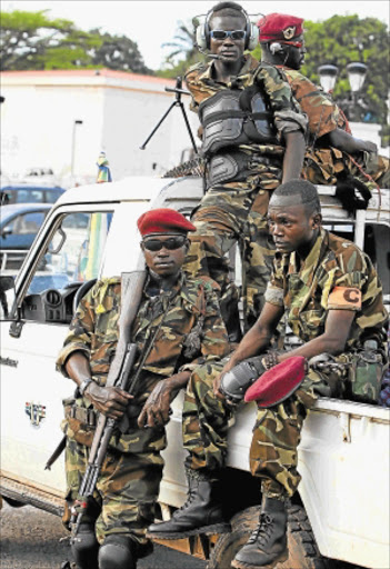 SEIZING POWER: Seleka rebels in a vehicle carrying the South African flag in Bangui. PHOTO: JAMES OATWAY