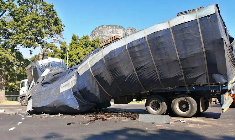 The truck carrying empty bottles which jack-knifed when the driver attempted a U-turn on the M3 in Cape Town's southern suburbs on November 28 2019.