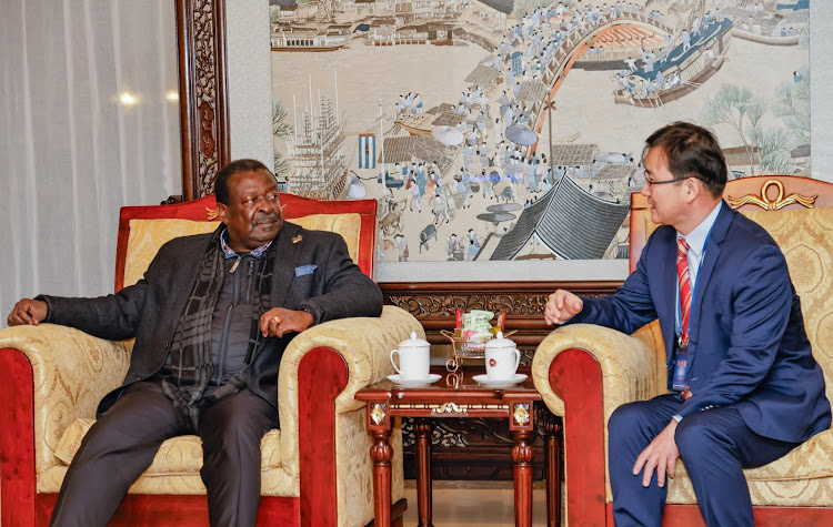 Prime CS Musalia Mudavdi engages official in China after his arrival on Wednesday, January 24, 2024.