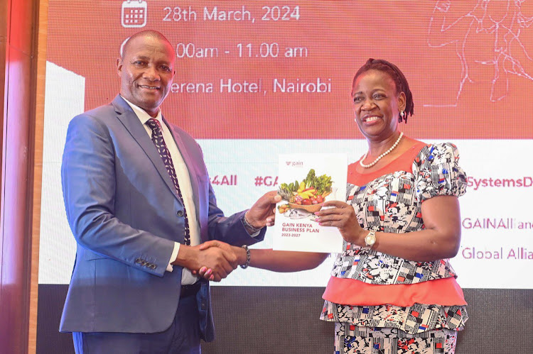 Nyandarua Governor Moses Badilisha and GAIN Kenya country director Ruth Okowa during the launch of the Kenya Business Plan 2023-2027