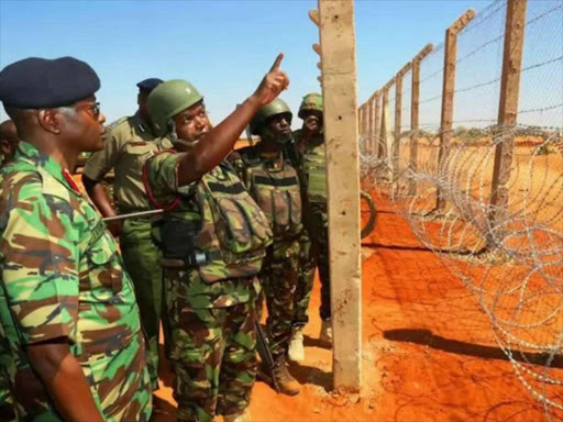 A file photo of Inspector General of Police Joseph Boinnet at the site of the Kenya-Somalia security wall. /COURTESY