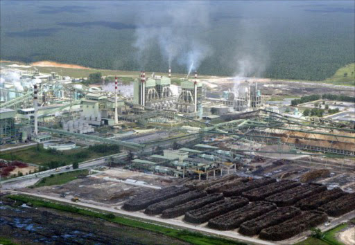 This file photo shows smoke rise from the factory of pulp and paper giant Asia Pacific Resources International Holdings Limited in Pangkalan Kerinci, outside Pekanbaru, Riau.