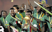 Zambia's captain Christopher Katongo celebrates with his teammates after winning the Africa Cup of Nations final against Ivory Coast in Gabon's capital, Libreville, on Sunday night Picture: THOMAS MUKOYA/REUTERS