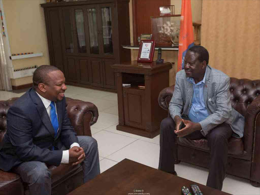 Nairobi Governor Mike Sonko with Opposition leader Raila Odinga during their meeting at Capitol Hill in Nairobi, April 20, 2018. /EVANS OUMA