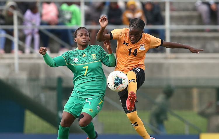 Zethembiso Vilakazi of SA challenges Agness Musase of Zambia during the Cosafa Women's Championship final at Isaac Wolfson Stadium in Gqeberha on September 11 2022.