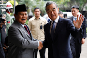 Indonesia’s defence minister and President-elect Prabowo Subianto greets Chinese foreign minister Wang Yi during their meeting in Jakarta, Indonesia, on April 18 2024. 