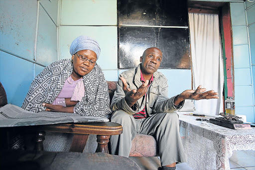 GRIEVING: A devastated Nontsapho Zembe and her husband Vusumzi speak about the deaths of their two sons on Saturday in Duncan Village. INSET: Victims Ntlanganiso Zembe, Visicelo Zembe and Lungisani Maxinzi Main picture: MARK ANDREWS