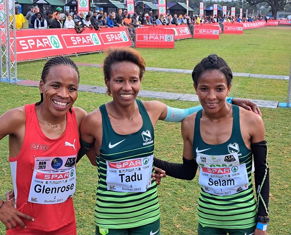 Top finishers at the Spar Grand Prix 10km in Durban Tadu Nare (in the centre,first), Selam Gebre (right, second) and Glenrose Xaba (left, third).