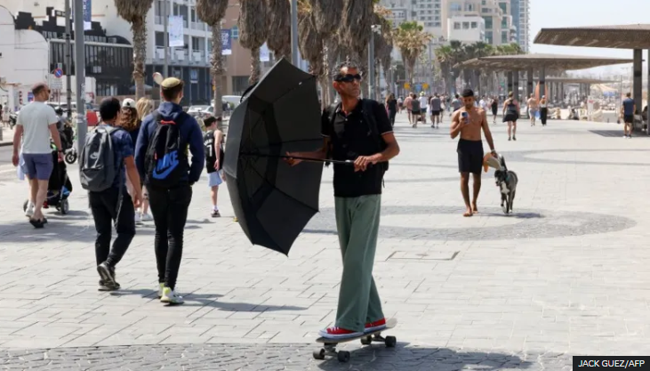 While sirens sounded in northern Israel, life continued as normal in Tel Aviv on Friday morning