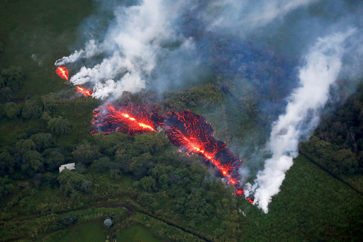 Lava erupts from a fissure east of the Leilani estates subdivision during ongoing eruptions of the Kilauea volcano in Hawaii, US, on May 13 2018.