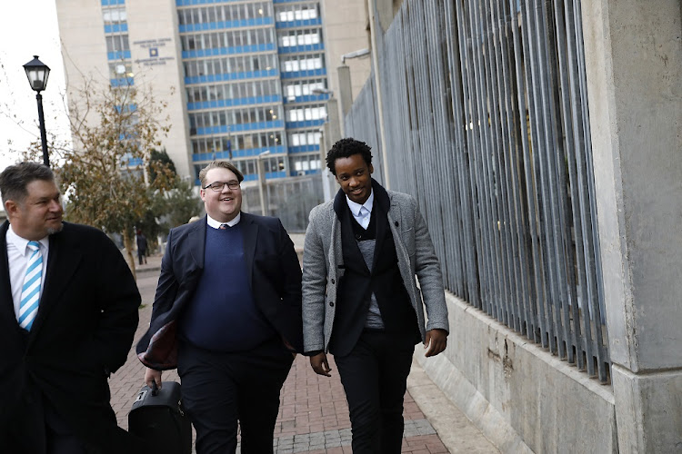 Duduzane Zuma arrives at Johannesburg Central Police Station to be processed prior to his appearance at the Specialised Commercial Crime Court.