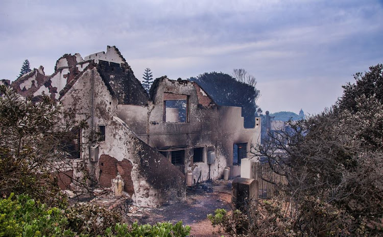 The aftermath of a fire that gutted at least 11 homes in St Francis Bay on Tuesday.