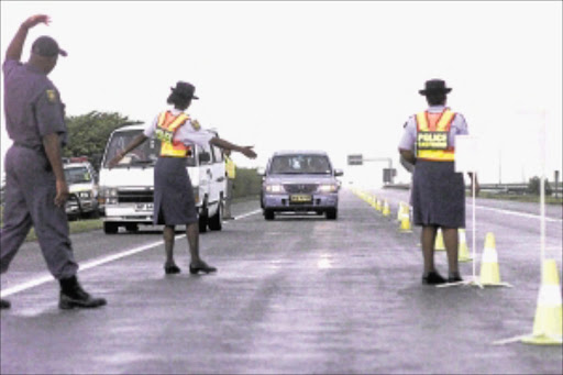 Police and traffic officers check cars and taxis on the N3 near Heidelberg during an operation. PHOTO: WATSON MCOTELI