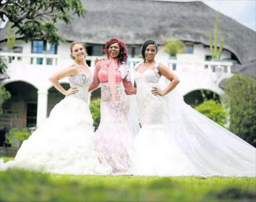 RUNWAY READY: Models, from left, Gia Roos, Nella Mtongana and Debrinah Hendricks of Just Models give a sneak peek of the bridalwear that will feature in a fashion show at this weekend’s bridal fair at Hemingways Mall. The fashion show will take place at the food court at 1pm today. The bridal fair is also on tomorrow Picture: Mark Andrews