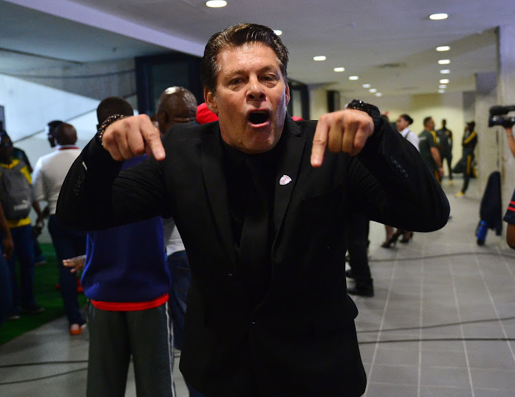 Free State Stars' Belgian coach Luc Eymael celebrates after his side beat Kaizer Chiefs 2-0 to advance to the final of the Nedbank Bank.