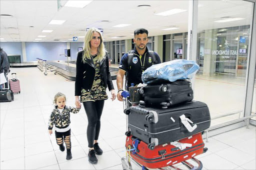 ALL ABOARD: J P Duminy with wife Sue and daughter Isabella arrive at the East London airport ahead of SA’s third one-day game against Bangladesh Picture: MICHAEL PINYANA