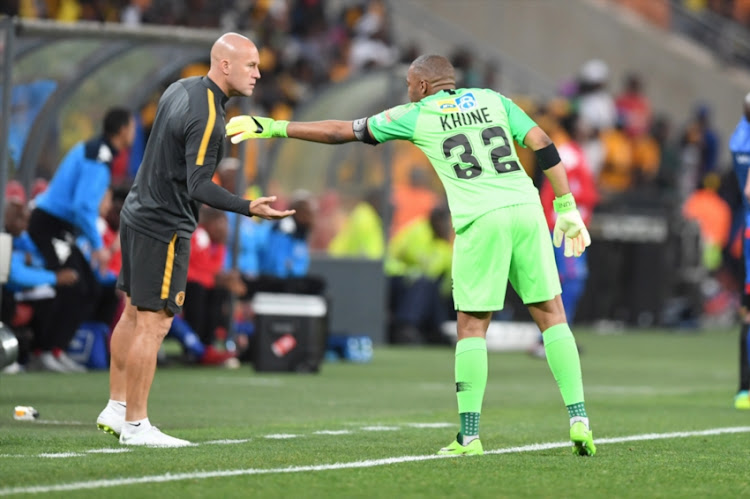 Goalkeeper coach Lee Baxter and Itumeleng Khune during the MTN 8, semi final 2nd Leg match between Kaizer Chiefs and SuperSport United at FNB Stadium on September 01, 2018 in Johannesburg, South Africa.