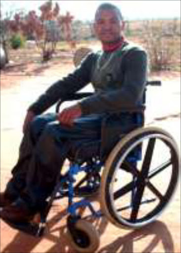 PARALYSED: Charles Masombuka from Marapyane in Mpumalanga was involved in near-fatal accident two years ago. Pic. Alfred Moselakgomo. 25/07/07. © Sowetan.