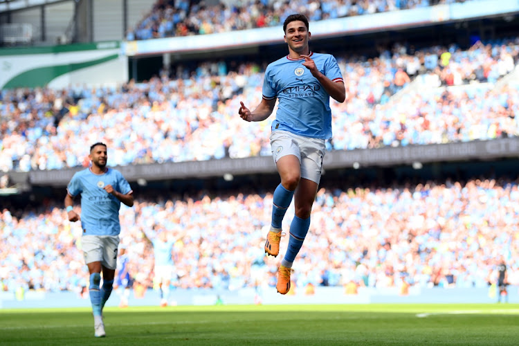 Julian Alvarez of Manchester City celebrates scoring in the Premier League match against Chelsea at Etihad Stadium in Manchester on May 21 2023.