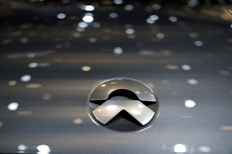 A Nio logo at the Beijing International Automotive Exhibition in Beijing, China. Picture: TINGSHU WANG/REUTERS