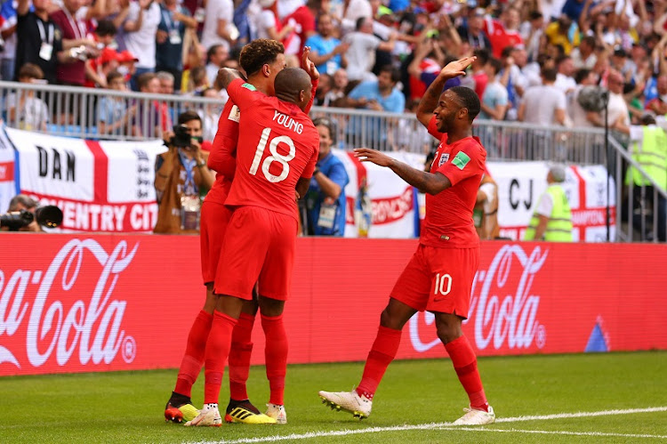 Dele Alli of England celebrates scoring a goal to make it 0-2 with Ashley Young and Raheem Sterling during the 2018 FIFA World Cup Russia Quarter Final match between Sweden and England at Samara Arena on July 7, 2018 in Samara, Russia.