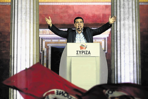 SAMBA OR TANGO? Alexis Tsipras, leader of Greece's radical leftist Syriza party, greets supporters after winning Sunday's general election, which saw Greeks revolt against five years of unrelenting austerity