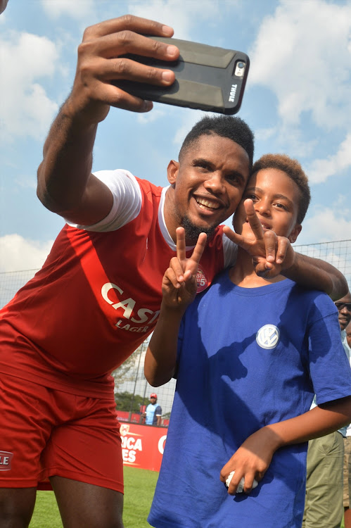 Samuel Eto'o Fils is a Cameroonian professional footballer with Football legend Mark Haskins son Mikael Haskins during the Castle Africa 5's Media Launch at Dicovery Soccer Park on January 11, 2018 in Johannesburg, South Africa.