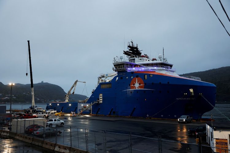 Equipment that was flown in by US Air Force transport planes is loaded onto the offshore vessel Horizon Arctic, before its deployment to the search area of a missing OceanGate Expeditions submersible which had been carrying five people to explore the sunken Titanic, in the port of St. John’s, Newfoundland, Canada, on June 20 2023. Picture: REUTERS